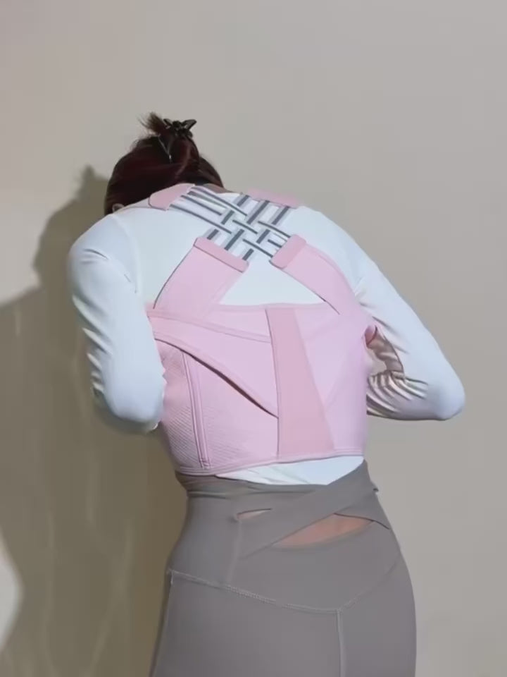Load video: video showing the posture corrector in action